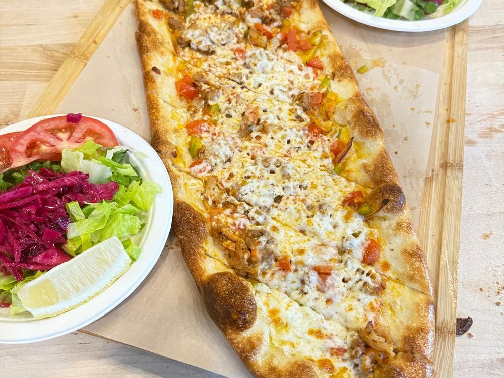 Kıymalı pide with salad, from our kitchen
