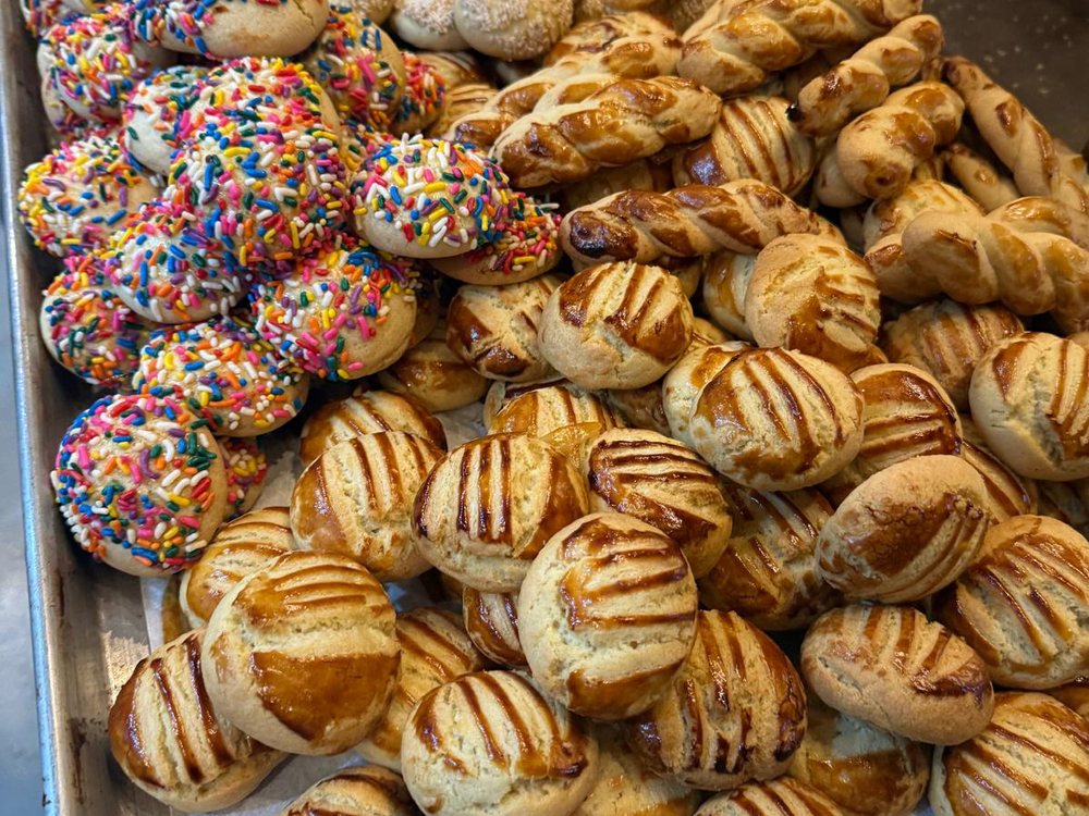 Tray of poğaça and sprinkle-topped pastries